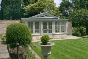 garden room in lush garden