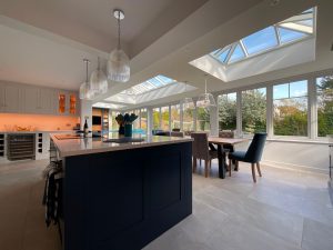 kitchen extension in large double roof lantern orangery