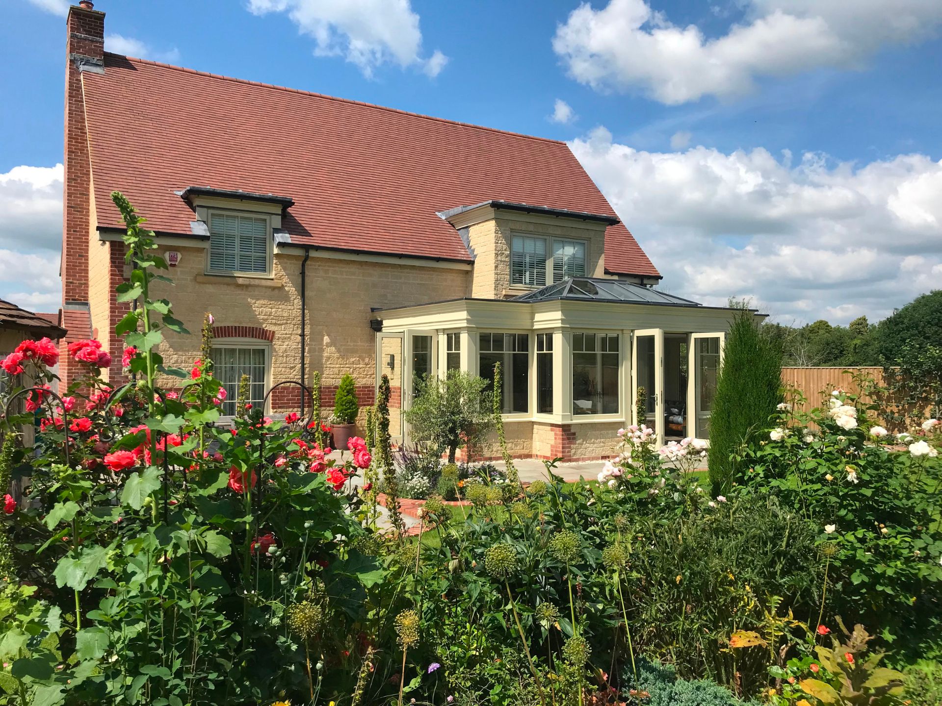 sage green orangery on large house