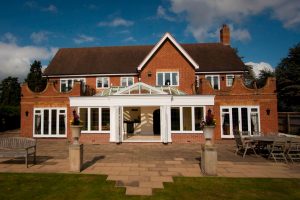 white orangery extension orange brick