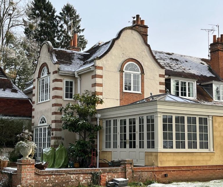 period property orangery extension in winter with snow