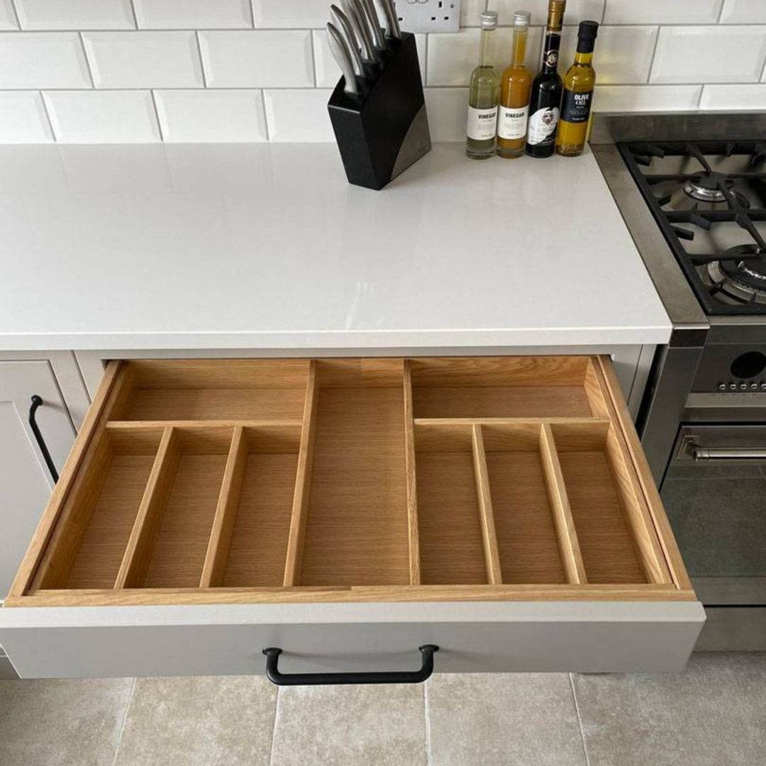 opened cutlery drawer in kitchen