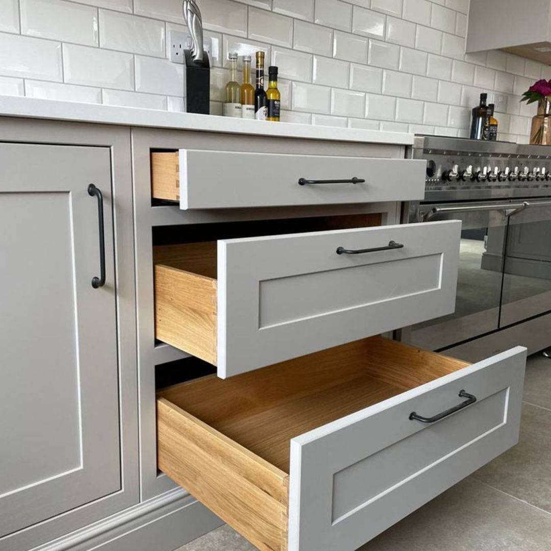 grey timber kitchen drawers opened